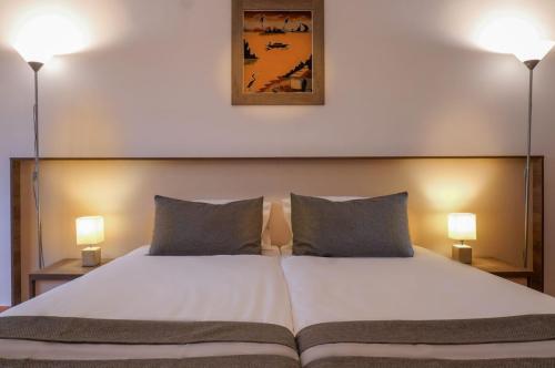 Standard Room Comfortable bed at Sun Beach Hotel-min